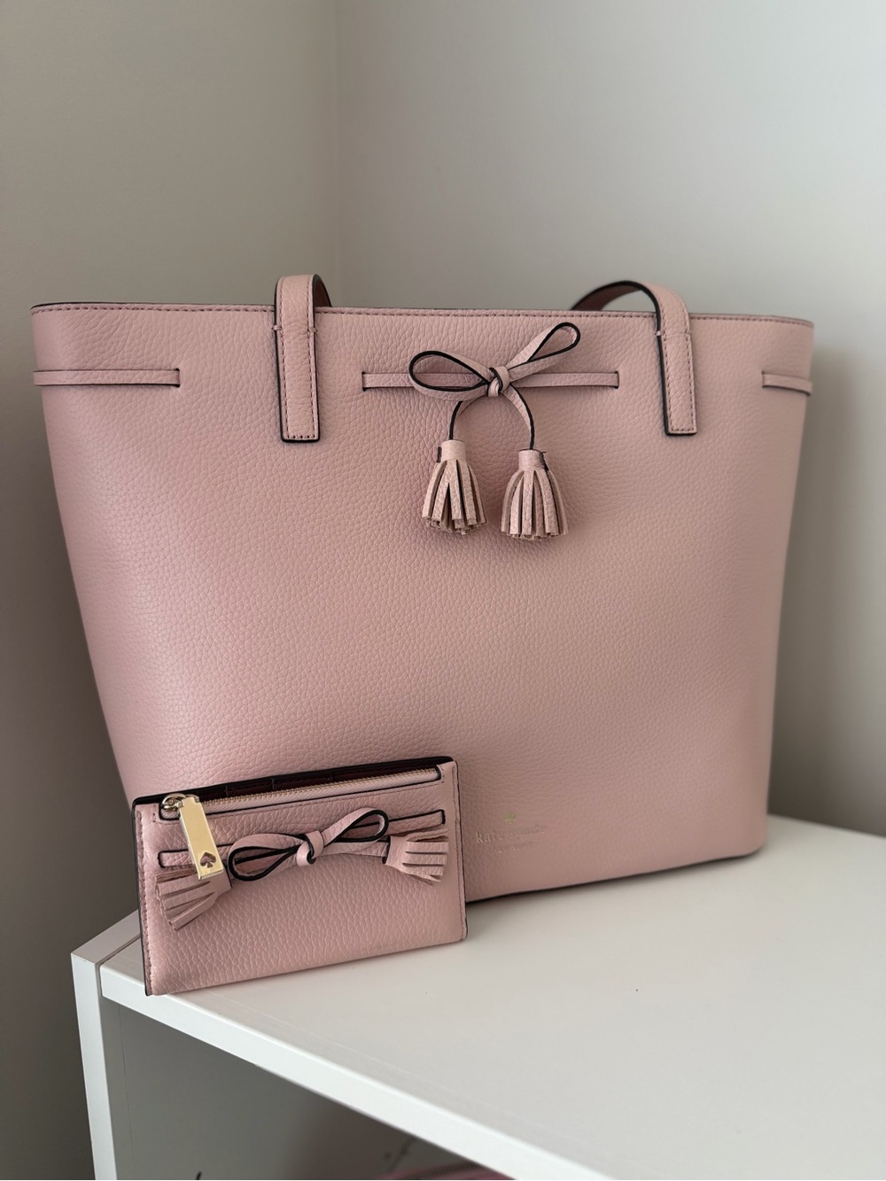 kate spade blush pink leather tote with tassel accents and matching card case